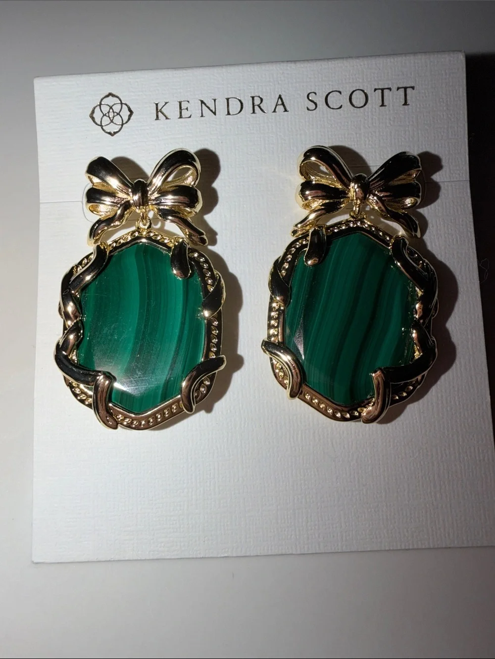 Kendra Scott Gold Bow Earrings with Emerald-Green Stones